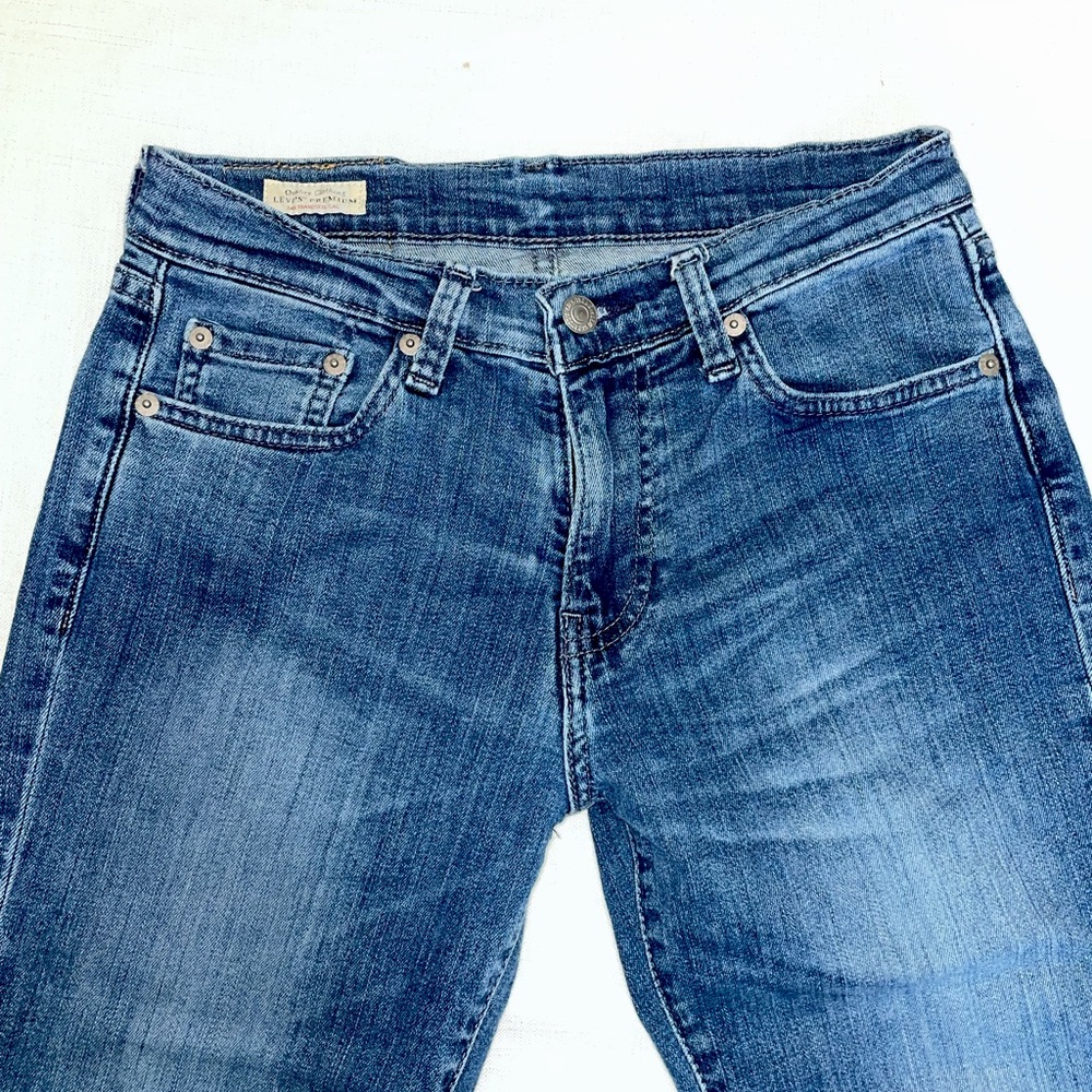 Levi’s 511 straight leg, mid-rise jeans